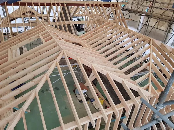 Double Dormer Roof — photo 1 of 6